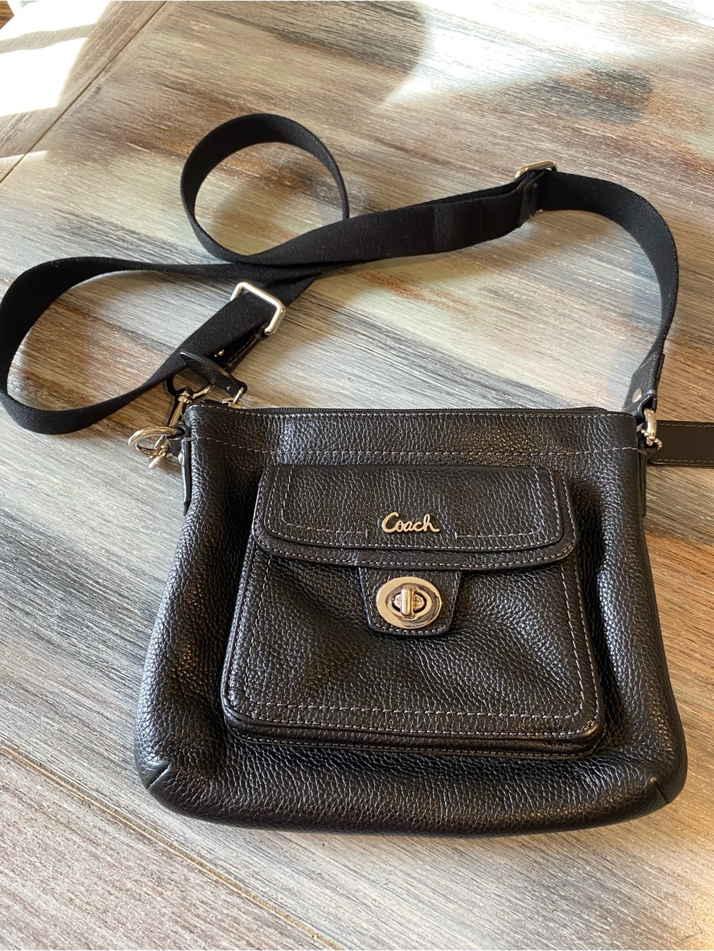 Coach small crossbody bag front turn-lock pocket black pebbled leather